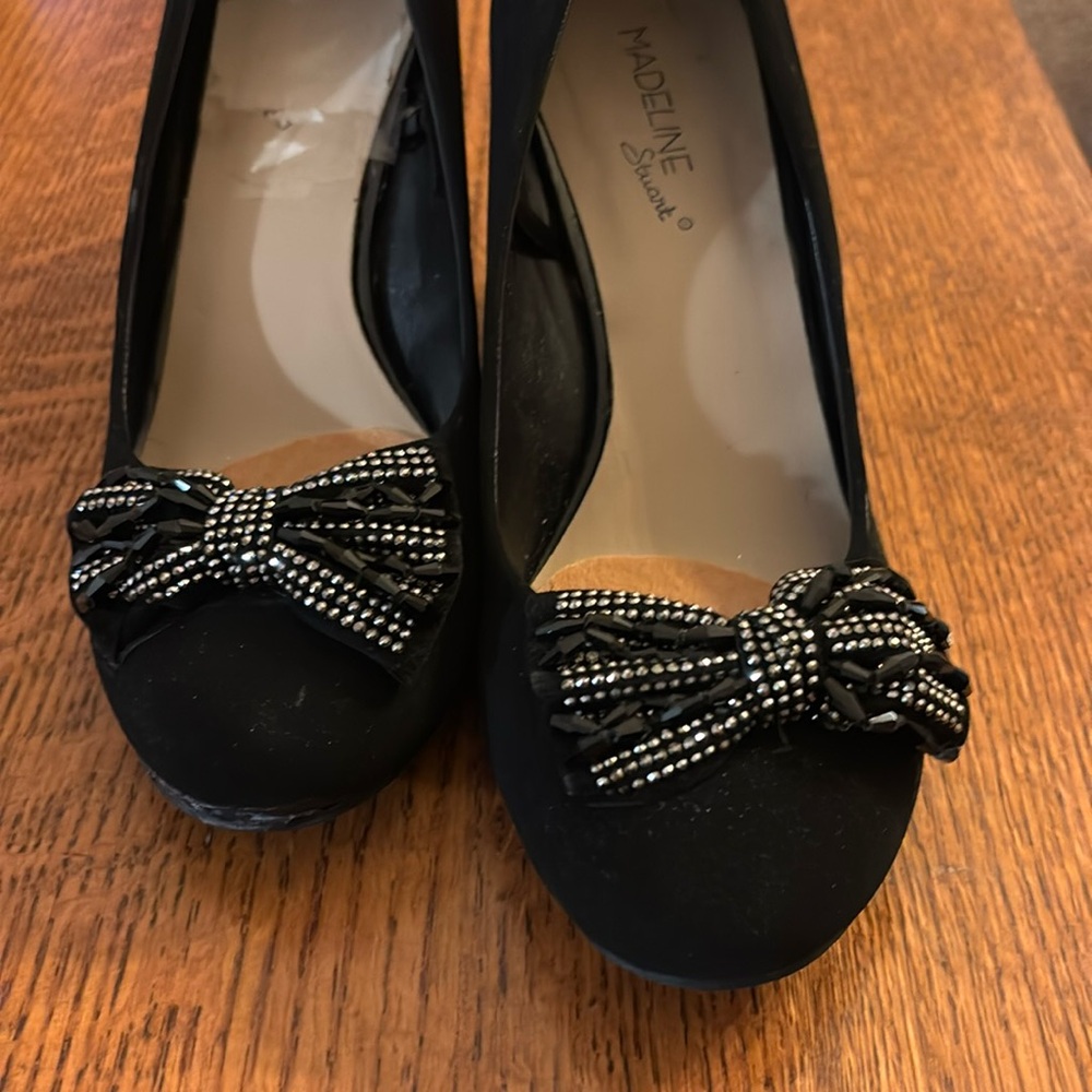 Black suede like dress shoes with Sparkly bows, women's size 8 .